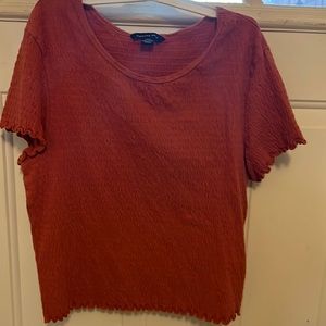 Size Medium Rust color stretchy top
